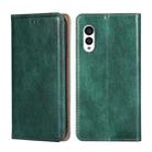 For Fujitsu Arrows N F-51C Gloss Oil Solid Color Magnetic Leather Phone Case(Green) - 1