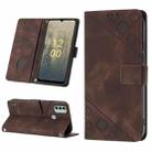 For Nokia C31 Skin-feel Embossed Leather Phone Case(Brown) - 1