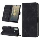 For Nokia C31 Skin-feel Embossed Leather Phone Case(Black) - 1