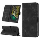 For Nokia C100 Skin-feel Embossed Leather Phone Case(Black) - 1