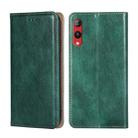 For Rakuten Hand 4G Gloss Oil Solid Color Magnetic Leather Phone Case(Green) - 1