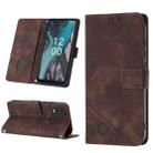 For Nokia C22 Skin-feel Embossed Leather Phone Case(Brown) - 1