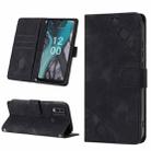 For Nokia C22 Skin-feel Embossed Leather Phone Case(Black) - 1