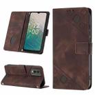 For Nokia C32 Skin-feel Embossed Leather Phone Case(Brown) - 1