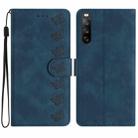 For Sony Xperia 10 V 2023 Seven Butterflies Embossed Leather Phone Case(Blue) - 1