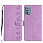 For Motorola Moto G10 Seven Butterflies Embossed Leather Phone Case(Purple) - 1