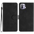 For Xiaomi Mi 11 Pro Seven Butterflies Embossed Leather Phone Case(Black) - 1