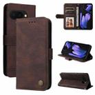 For Google Pixel 9a Skin Feel Life Tree Metal Button Leather Phone Case(Brown) - 1