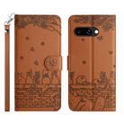 For Google Pixel 9a Cat Embossing Pattern Leather Phone Case with Lanyard(Brown) - 1