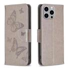 For iPhone 15 Pro Max Embossing Two Butterflies Pattern Leather Phone Case(Grey) - 1