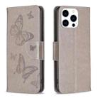 For iPhone 15 Pro Embossing Two Butterflies Pattern Leather Phone Case(Grey) - 1