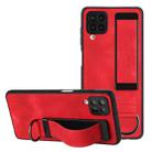 For Samsung Galaxy A12 Wristband Holder Leather Back Phone Case(Red) - 1