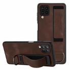 For Samsung Galaxy A12 Wristband Holder Leather Back Phone Case(Coffee) - 1
