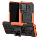 For Xiaomi Mi 10 Lite 5G Tire Texture Shockproof TPU+PC Protective Case，with Holder(Orange) - 1