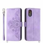 For Samsung Galaxy Xcover 7 Skin-feel Flowers Embossed Wallet Leather Phone Case(Purple) - 1