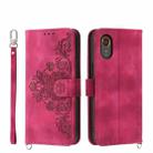For Samsung Galaxy Xcover 7 Skin-feel Flowers Embossed Wallet Leather Phone Case(Wine Red) - 1