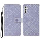 For Samsung Galaxy S23 FE 5G Ethnic Style Embossed Pattern Leather Phone Case(Purple) - 1