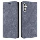 For Samsung Galaxy S23 FE 5G Ethnic Embossed Adsorption Leather Phone Case(Grey) - 1