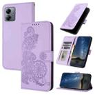 For Motorola Moto G14 Datura Flower Embossed Flip Leather Phone Case(Purple) - 1