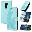 For  Xiaomi Redmi 9 Datura Flower Embossed Flip Leather Phone Case(Light blue) - 1