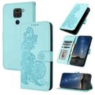 For Xiaomi Redmi Note 9 Datura Flower Embossed Flip Leather Phone Case(Light blue) - 1