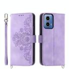 For Motorola Moto G34 Skin Feel Flowers Embossed Wallet Leather Phone Case(Purple) - 1