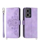 For Motorola Moto G85 Skin-feel Flowers Embossed Wallet Leather Phone Case(Purple) - 1