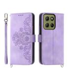 For Motorola Moto G15 Skin Feel Flowers Embossed Wallet Leather Phone Case(Purple) - 1
