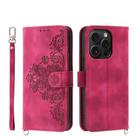For iPhone 15 Pro Skin-feel Flowers Embossed Wallet Leather Phone Case(Wine Red) - 1