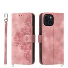 For iPhone 15 Skin-feel Flowers Embossed Wallet Leather Phone Case(Pink) - 1