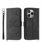 For iPhone 16 Pro Skin-feel Flowers Embossed Wallet Leather Phone Case(Black) - 1