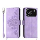 For iPhone 17 Pro Skin-feel Flowers Embossed Wallet Leather Phone Case(Purple) - 1
