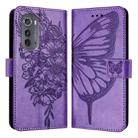 For Motorola Edge 2022 / Edge+ 5G UW 2022 Embossed Butterfly Leather Phone Case(Purple) - 1