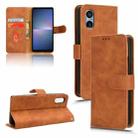 For Sony Xperia 5 V 2023 Skin Feel Magnetic Flip Leather Phone Case(Brown) - 1