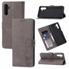 For Samsung Galaxy A25 Embossed Happy Cat Pattern Flip Leather Phone Case(Grey) - 1