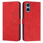 For Sony Xperia 5 V Skin Feel Heart Embossed Leather Phone Case with Long Lanyard(Red) - 1