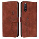 For Sony Xperia 10 V 2023 Skin Feel Heart Embossed Leather Phone Case with Long Lanyard(Brown) - 1