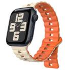 For Apple Watch SE 2023 44mm Reverse Buckle Two Color Magnetic Silicone Watch Band(Starlight+Orange) - 1