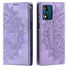 For Motorola Moto E13 Totem Embossed Magnetic Leather Phone Case(Purple) - 1