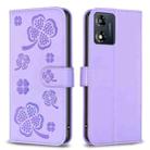 For Motorola Moto E13 4G Four-leaf Embossed Leather Phone Case(Purple) - 1