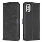 For Motorola Moto E32 4G Four-leaf Embossed Leather Phone Case(Black) - 1