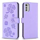 For Motorola Moto E32 4G Four-leaf Embossed Leather Phone Case(Purple) - 1