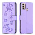 For Motorola Moto E40 / E30 Four-leaf Embossed Leather Phone Case(Purple) - 1