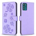 For Motorola Moto G42 Four-leaf Embossed Leather Phone Case(Purple) - 1