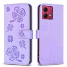 For Motorola Moto G84 Four-leaf Embossed Leather Phone Case(Purple) - 1