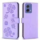 For Motorola Moto G85 Four-leaf Embossed Leather Phone Case(Purple) - 1