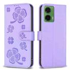 For Motorola Moto G35 Four-leaf Embossed Leather Phone Case(Purple) - 1