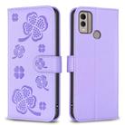 For Nokia C22 Four-leaf Embossed Leather Phone Case(Purple) - 1