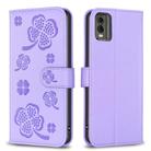 For Nokia C32 Four-leaf Embossed Leather Phone Case(Purple) - 1