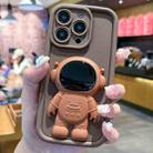 For iPhone 15 Pro Astronaut 3D Relief Holder TPU + PC Full Coverage Phone Case(Brown) - 1